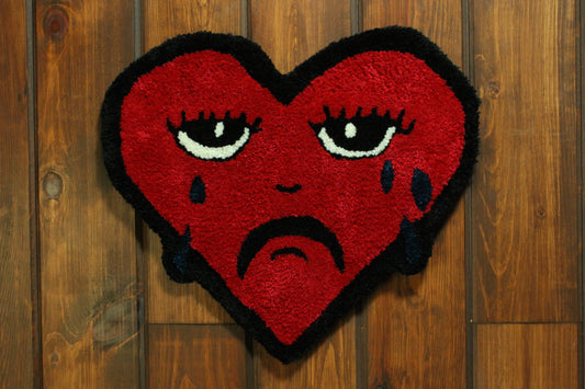 Tapis murale coeur triste